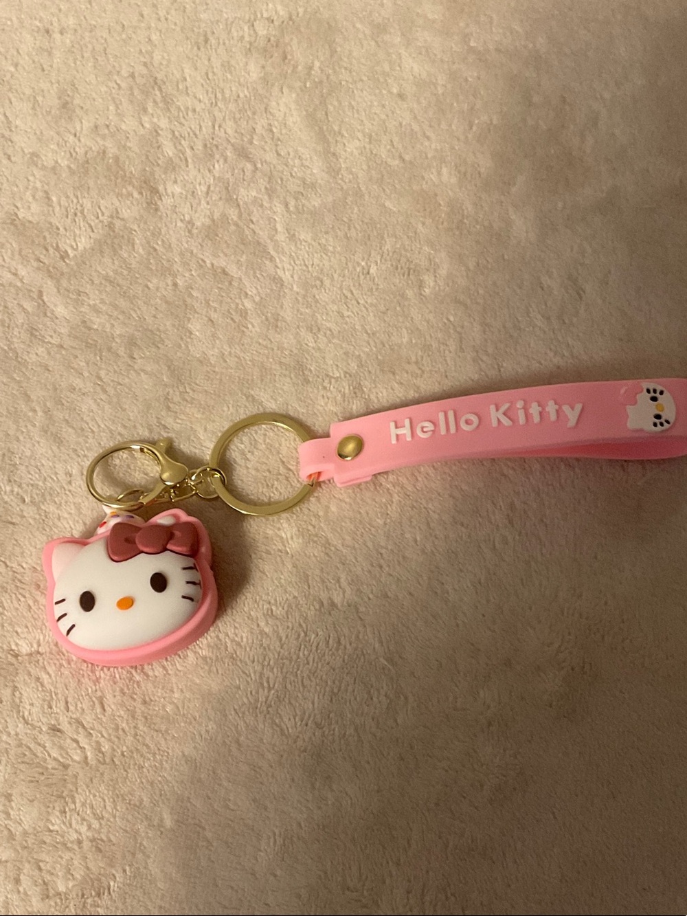 Hello Kitty Pink and White Silicone Wrist Keychain with Gold Hardware